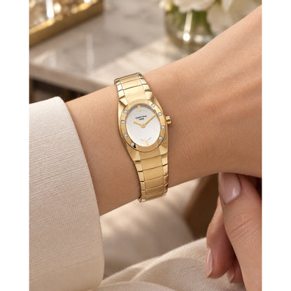 Certina DS Spel Mini Lady quartz watch worn on wrist with gold-tone stainless steel bracelet and white dial