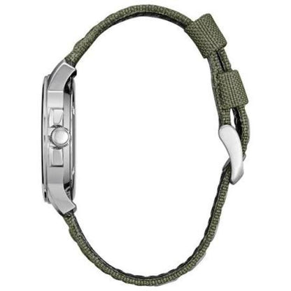 Citizen BM8180-03E with side profile stainless steel case, side crown, green nylon strap, strap keepers, and silver-tone buckle closure.