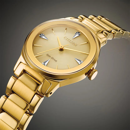 Citizen EM0732-51P womens dress watch close up with champagne dial, diamond hour markers and gold tone stainless steel bracelet showing elegant finish