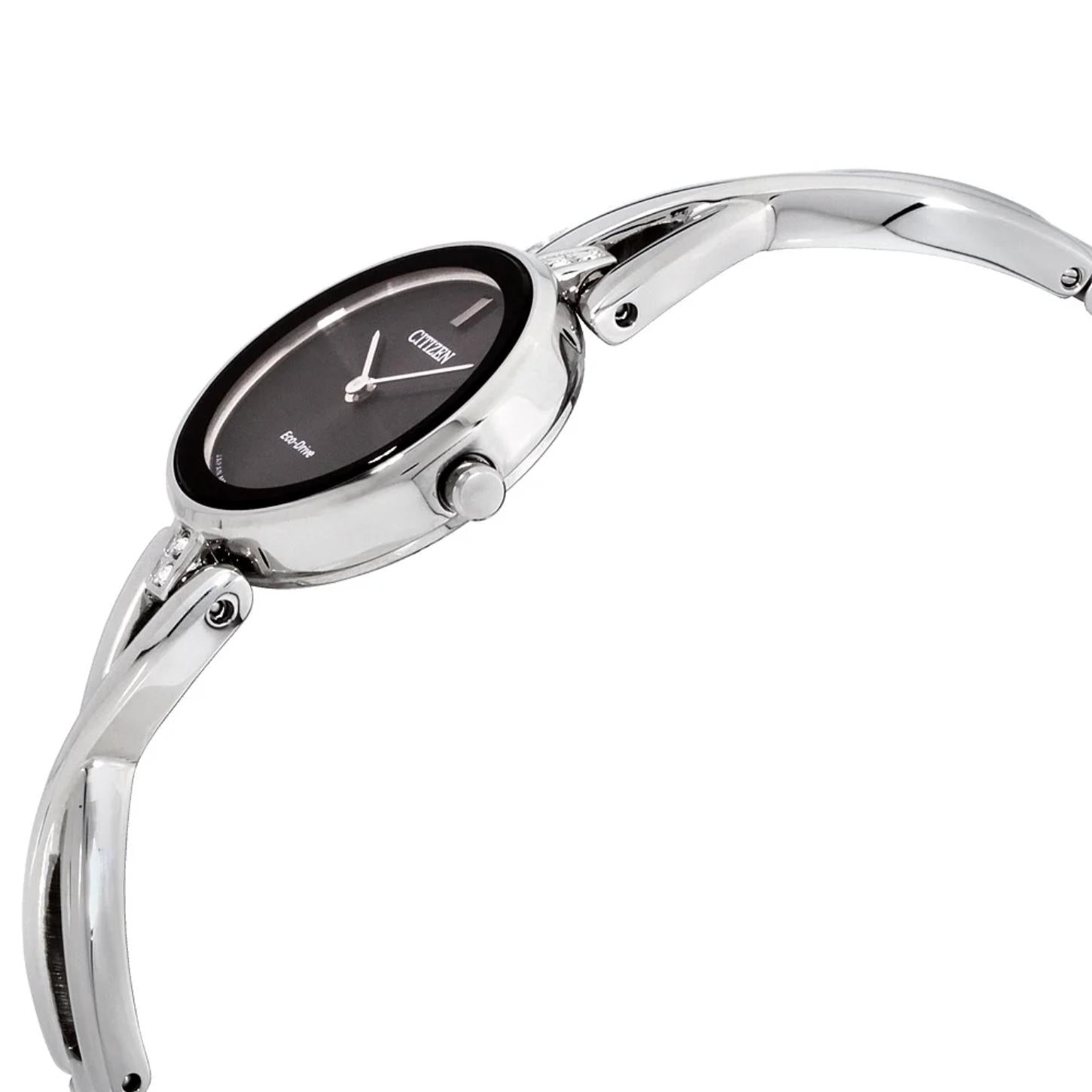 Citizen EX1420-50E Eco-Drive watch with black dial shown in side profile featuring stainless steel case, polished crown and slim bangle bracelet with curved design
