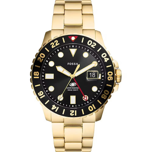 Reloj Fossil Blue GMT FS5990 dorado, bisel negro, esfera negra con función GMT y brazalete de acero brillante.