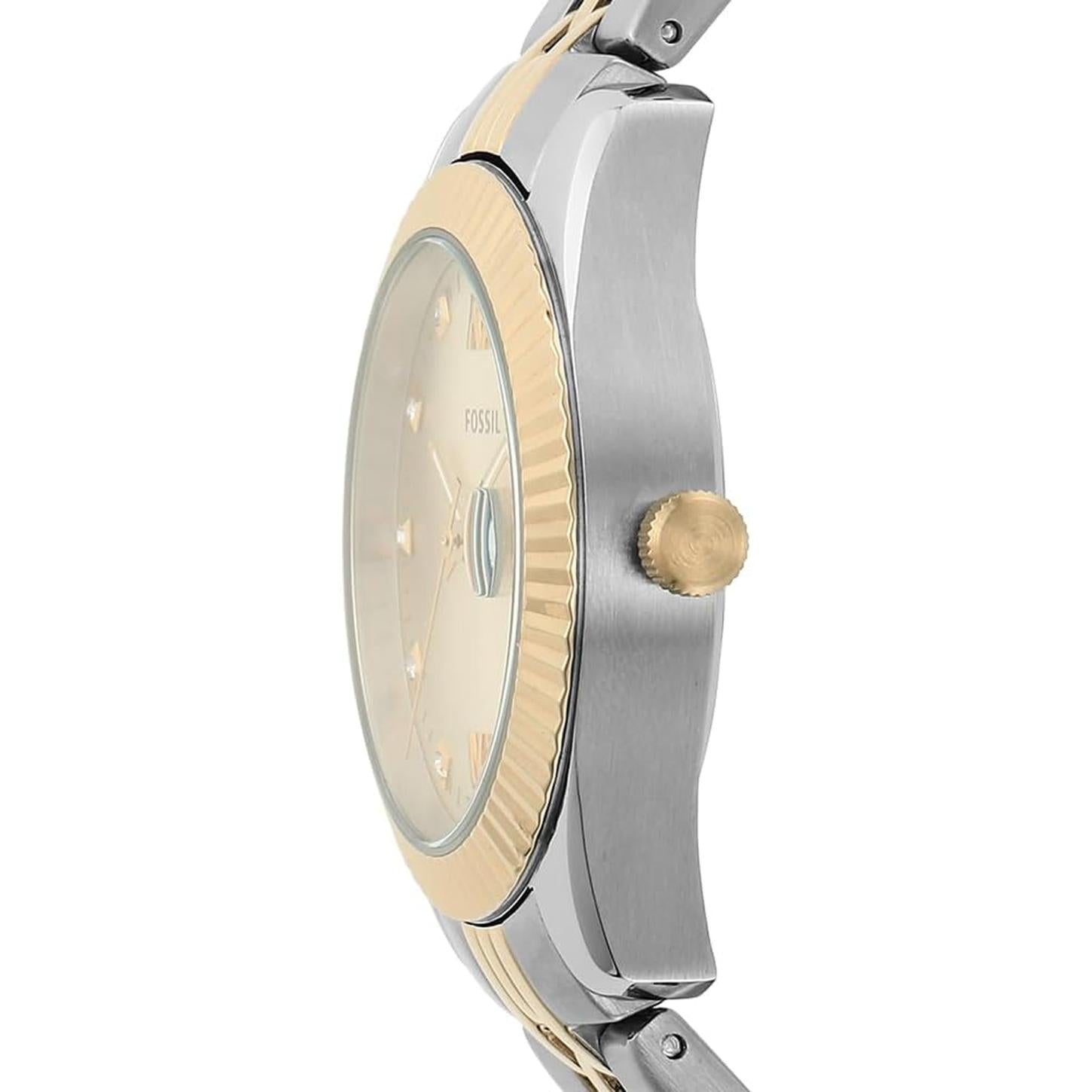 Fossil ES4949 side profile with stainless steel case, gold-tone fluted bezel, crown and two-tone bracelet.