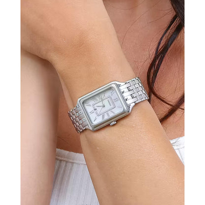 Fossil ES5306 womens rectangular watch with mother of pearl dial and stainless steel bracelet worn on wrist in elegant style