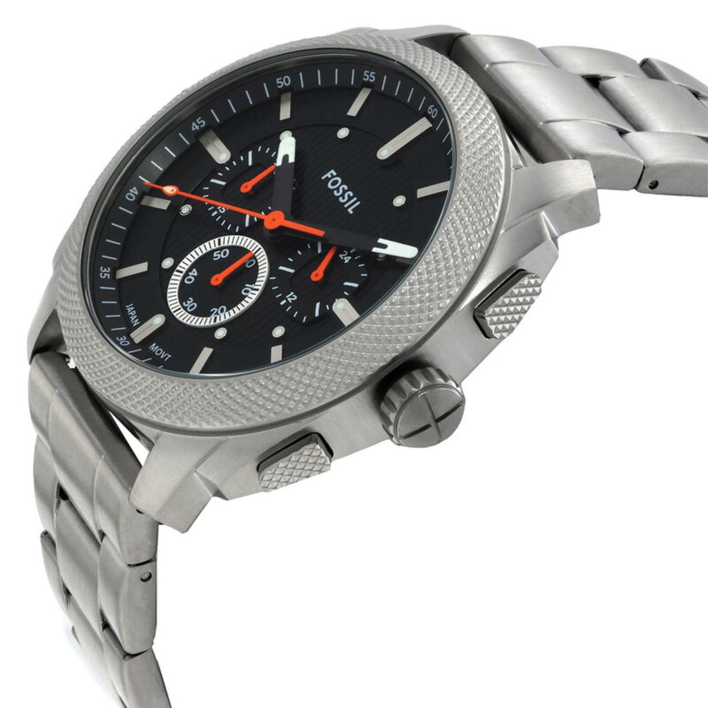 Fossil Machine FS6095 chronograph watch with textured black dial, orange chronograph hands, knurled stainless steel bezel, and brushed stainless steel bracelet shown in an angled close-up view.