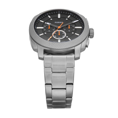 Fossil Machine FS6095 chronograph watch with textured black dial, orange accents, oversized stainless steel case, and brushed stainless steel bracelet shown in a front angled view.