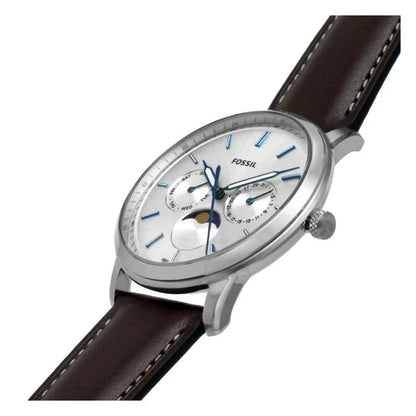 Fossil Neutra FS5905 men’s quartz watch with a silver dial, blue hands and markers, moon phase display, polished silver-tone case, and dark brown leather strap.