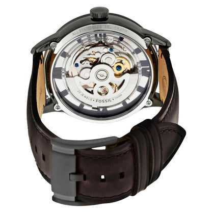 Fossil Townsman ME3098 with exhibition caseback, visible automatic movement, black stainless steel case, brown leather strap, and black buckle closure.