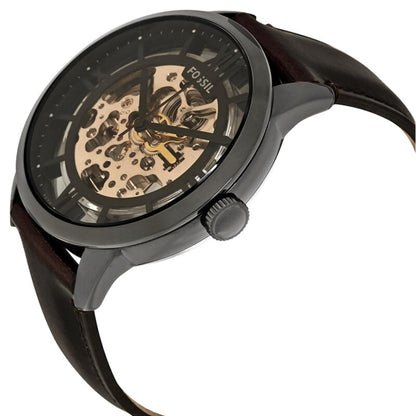 Fossil Townsman ME3098 with side profile black stainless steel case, skeleton dial, automatic movement, side crown, and brown leather strap.