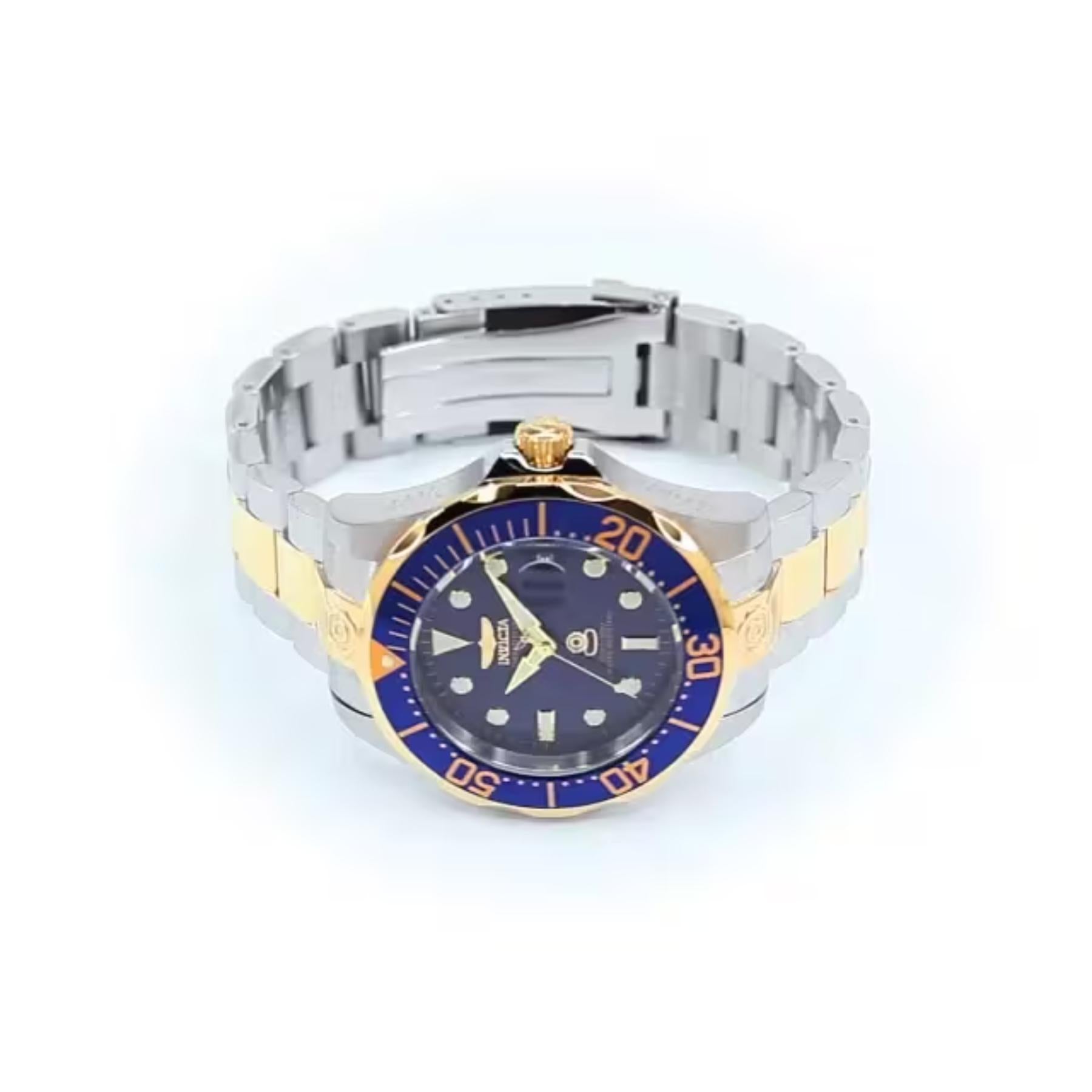 Invicta Grand Diver 3049 automatic dive watch with blue dial, blue bezel, and two-tone stainless steel bracelet shown with the bracelet open.