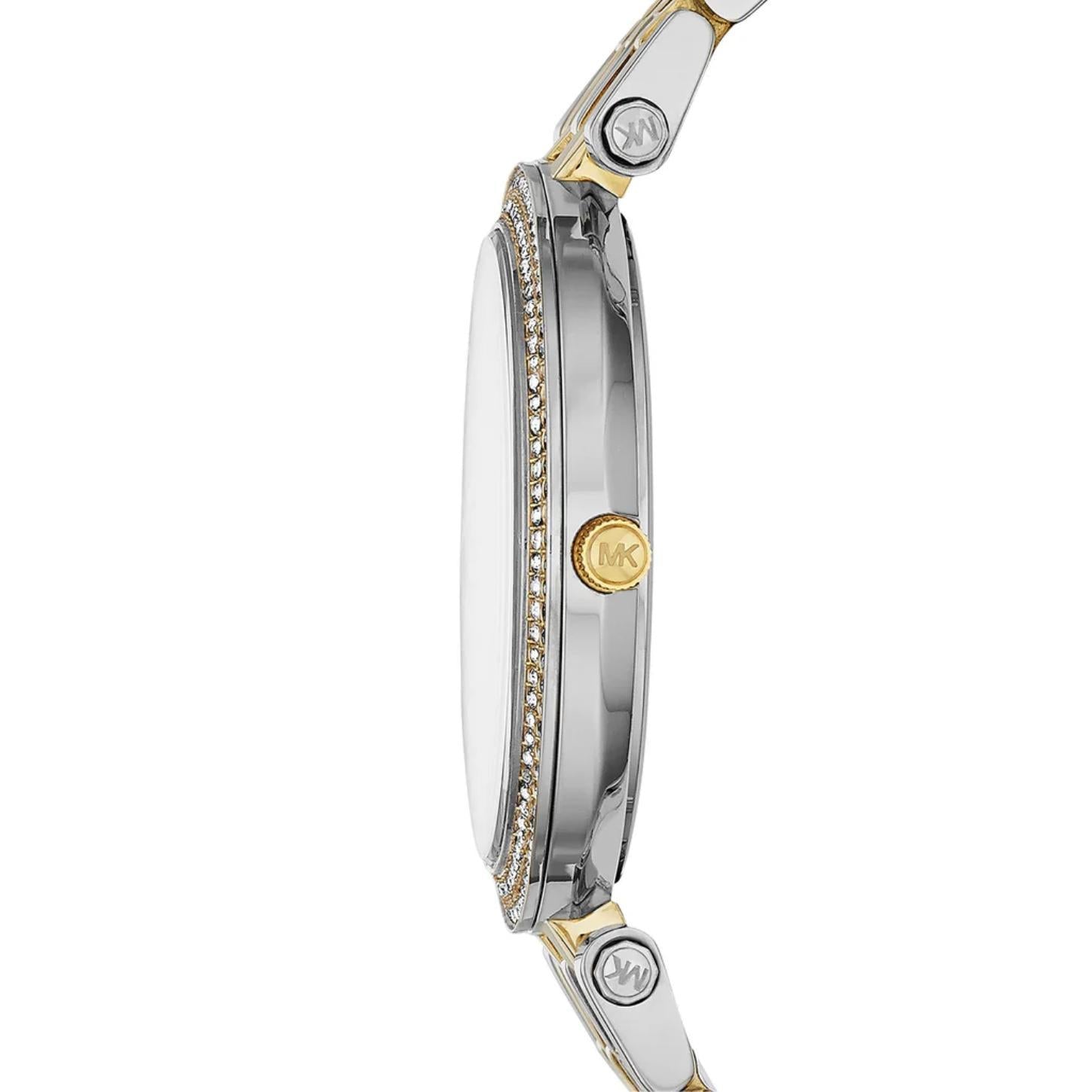 Michael Kors Darci MK3215 with slim two-tone stainless steel case, crystal-set bezel and engraved crown shown in side profile.