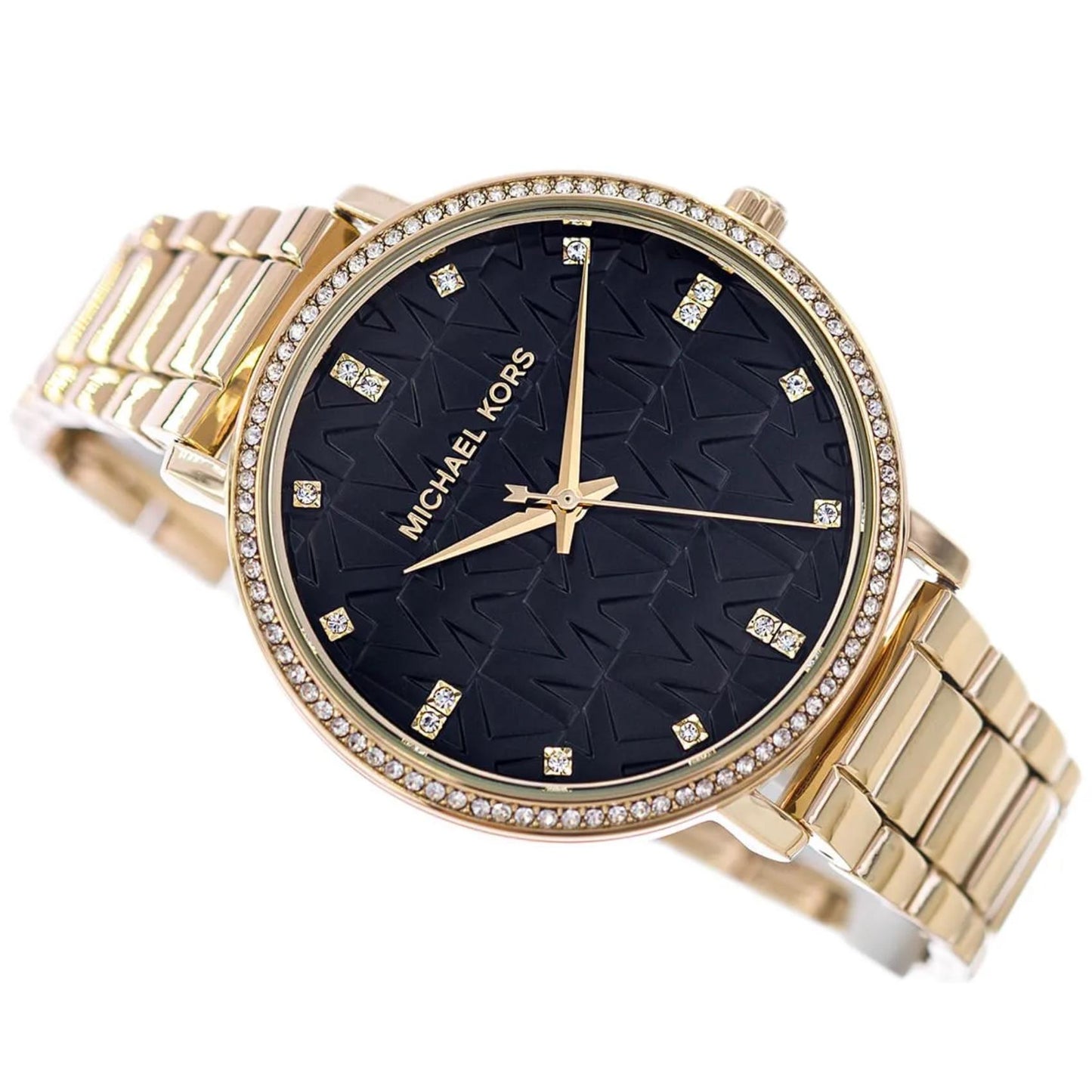 Michael Kors women’s watch with black MK logo dial, crystal hour markers, pavé crystal bezel and gold-tone stainless steel bracelet in angled view.