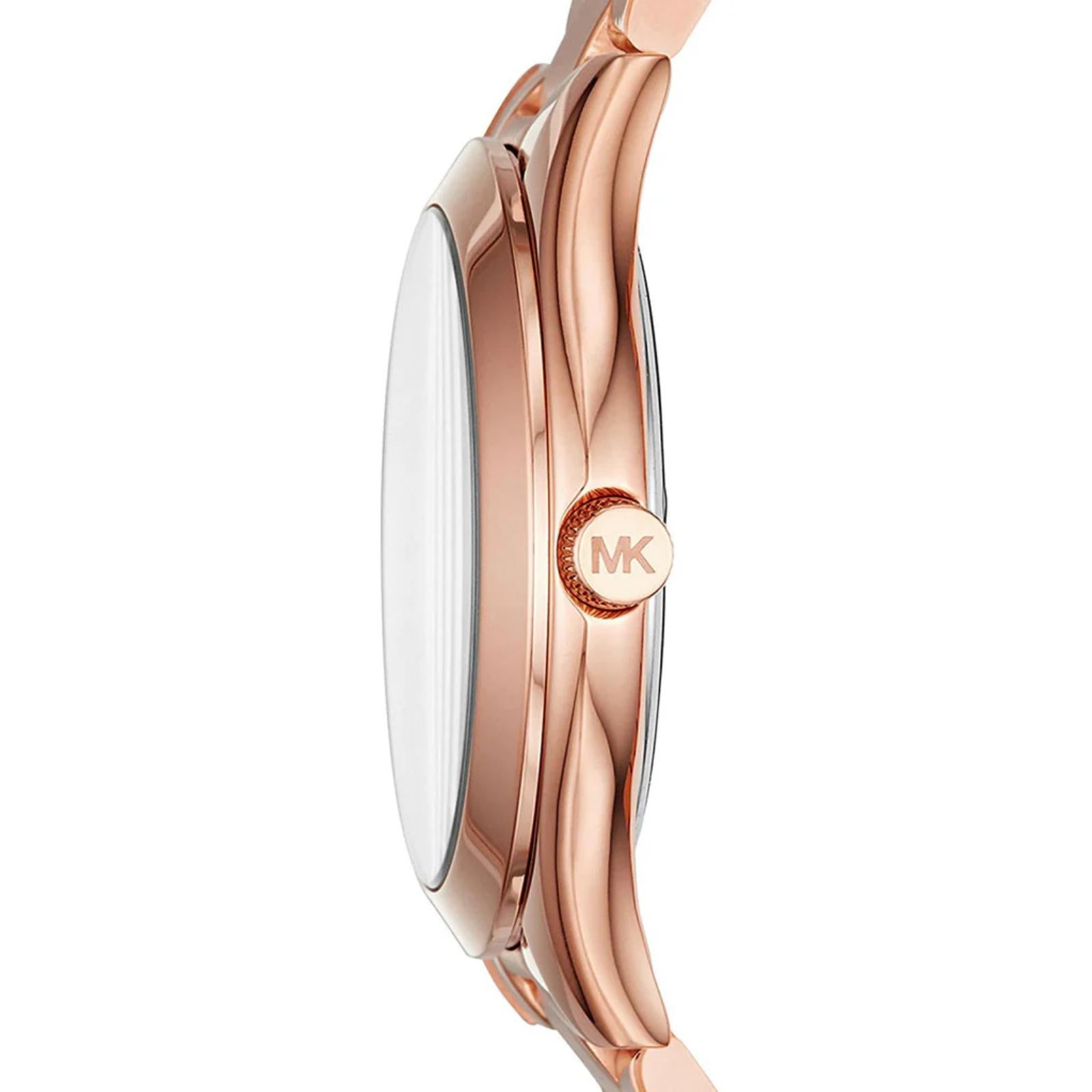 Michael Kors Mini Slim Runway MK3513 with slim rose gold-tone stainless steel case, engraved crown and polished side profile design.