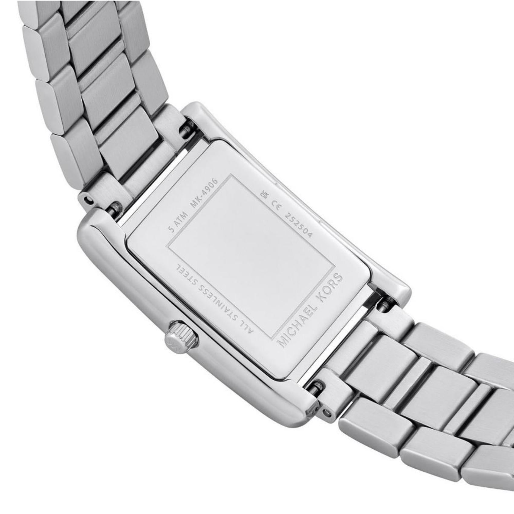 Michael Kors MK4906 Essex with rectangular stainless steel caseback, engraved rear cover and silver-tone link bracelet detail.