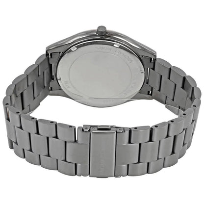 Michael Kors MK8576 with stainless steel caseback, gunmetal link bracelet and fold-over clasp with engraved logo.