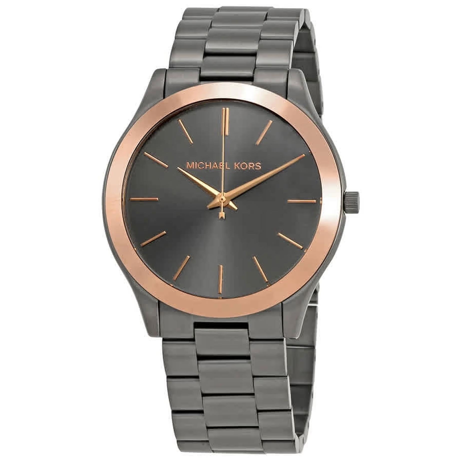Michael Kors MK8576 women’s watch with gunmetal sunray dial, rose gold-tone bezel accents and gunmetal stainless steel bracelet.