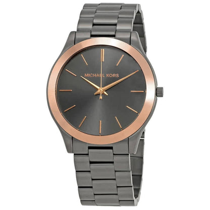 Michael Kors MK8576 women’s watch with gunmetal sunray dial, rose gold-tone bezel accents and gunmetal stainless steel bracelet.