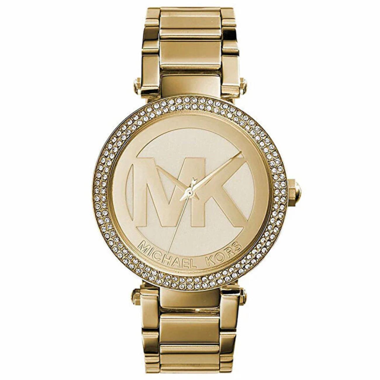 Michael Kors Parker MK5784 women’s fashion watch with gold-tone dial, oversized MK logo, crystal-set bezel, and gold-tone stainless steel bracelet.