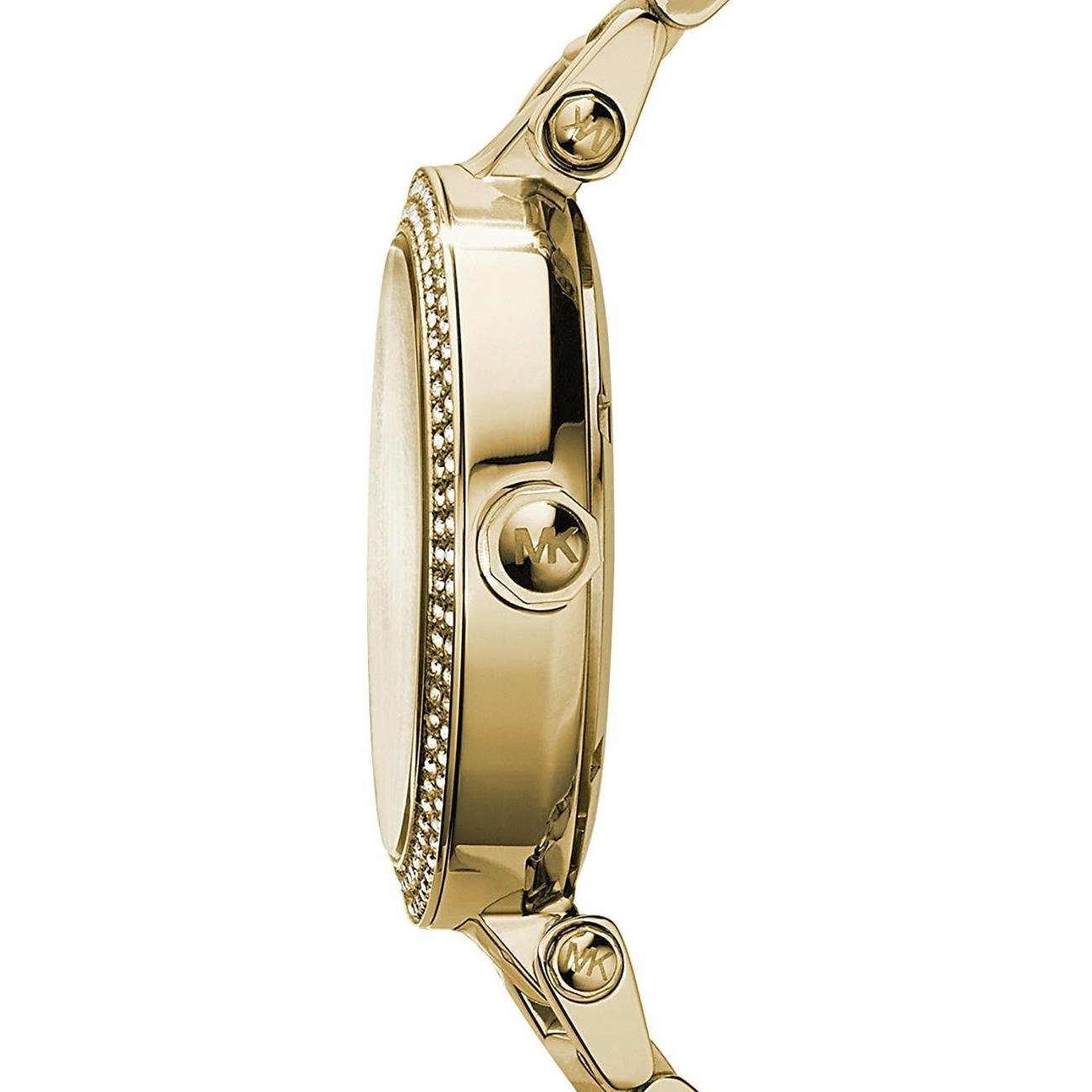 Michael Kors Parker MK5784 side profile view showing the gold-tone case thickness, crystal-set bezel, and engraved MK crown detail.