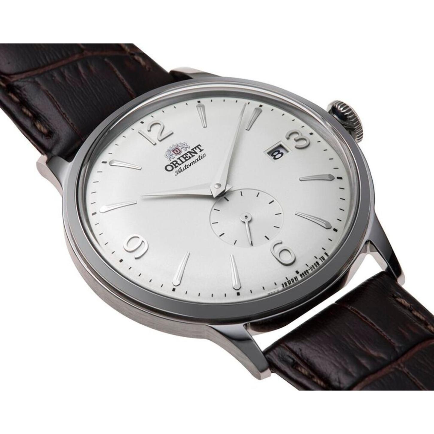 Orient Bambino Small Seconds RA-AP0002S10B close-up view showing the white dial, small seconds subdial, silver-tone markers, and brown crocodile-pattern leather strap.