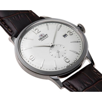 Orient Bambino Small Seconds RA-AP0002S10B close-up view showing the white dial, small seconds subdial, silver-tone markers, and brown crocodile-pattern leather strap.