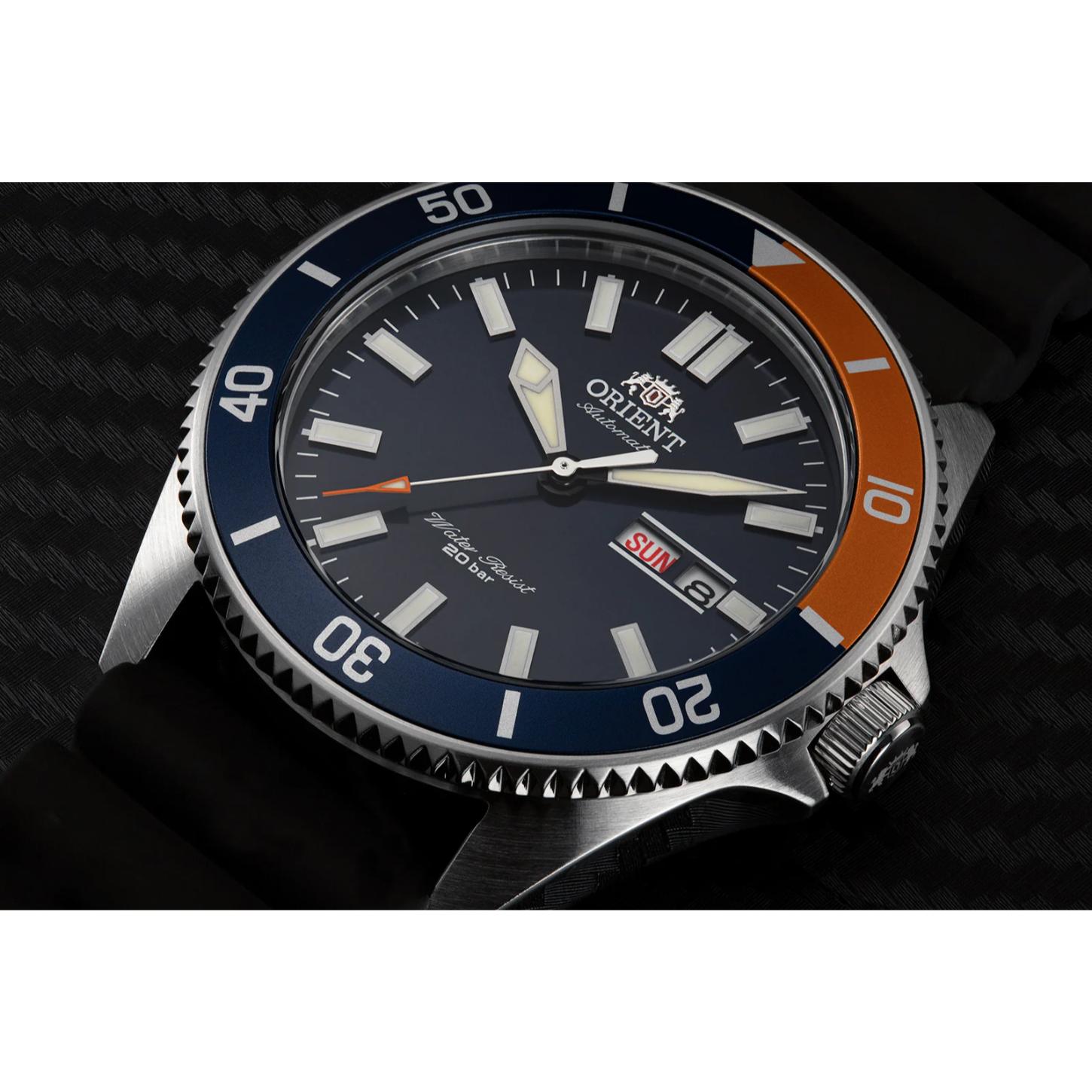 Orient RA-AA0916L19B close-up view showing the blue dial, blue and orange rotating bezel, luminous markers, and stainless steel case.