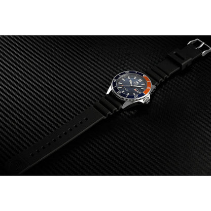 Orient RA-AA0916L19B automatic dive watch with blue dial, blue and orange bezel, and black rubber strap displayed on a textured black surface.