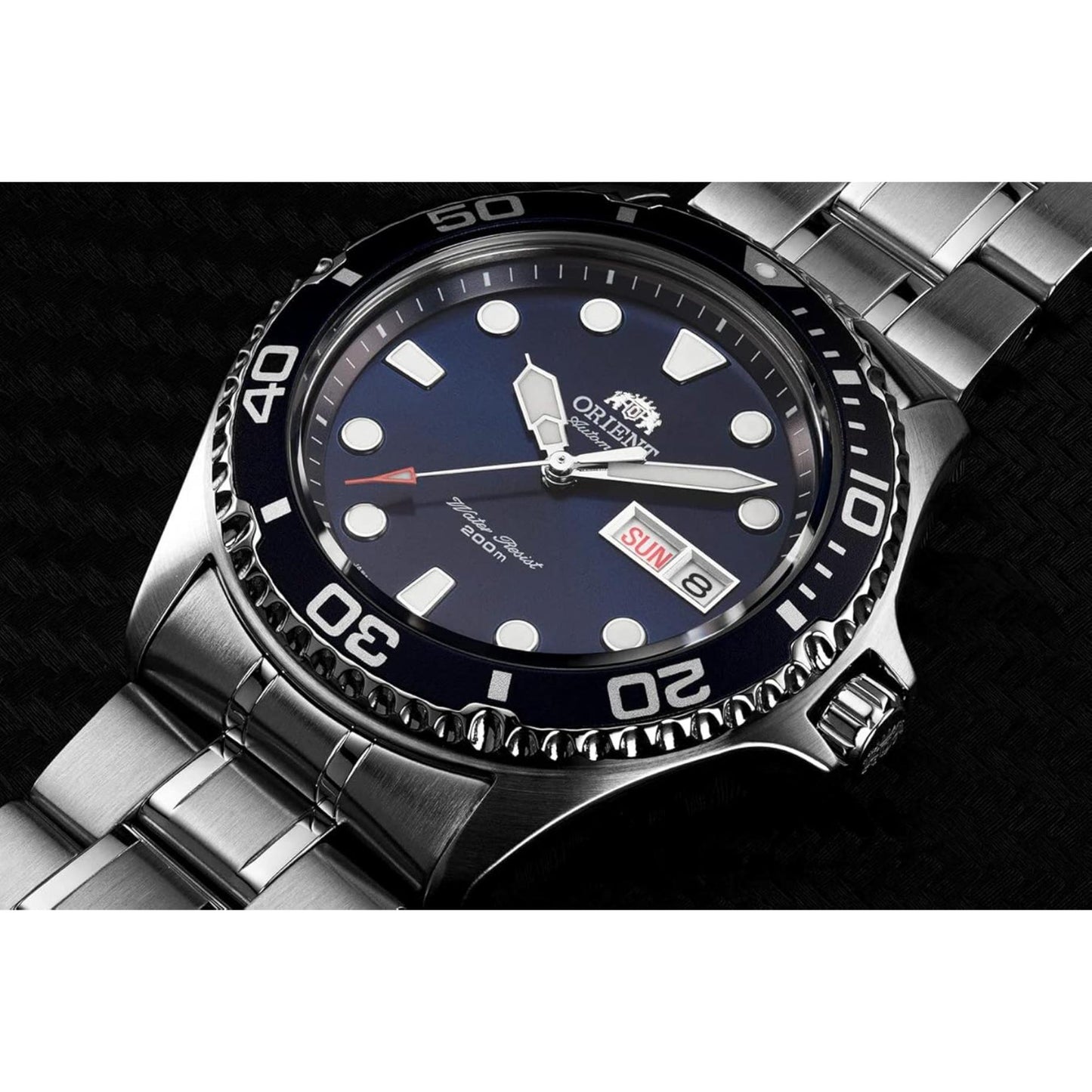 Orient Ray II FAA02005D9 close-up view showing the blue dial, blue rotating bezel, luminous markers, and stainless steel bracelet.