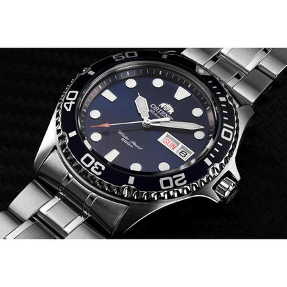 Orient Ray II FAA02005D9 close-up view showing the blue dial, blue rotating bezel, luminous markers, and stainless steel bracelet.