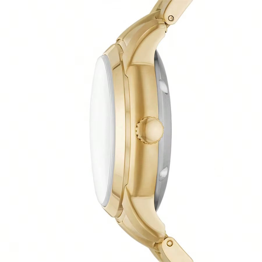 Vista lateral del reloj Fossil Heritage ME3226 automático, caja dorada, corona decorada, fondo blanco