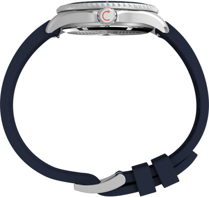 Vista lateral del reloj Timex Deepwater con correa de silicona azul y caja de acero.