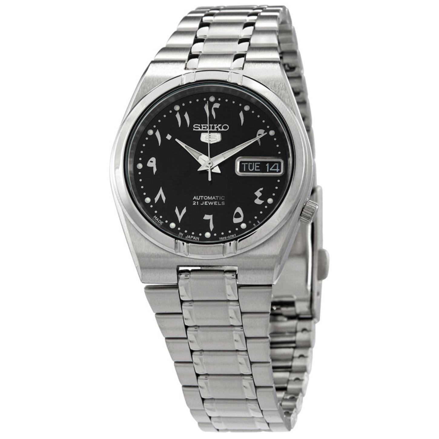 Seiko 5 SNK063J5 automatic watch featuring a black Arabic numeral dial, day-date display, silver-tone case, and stainless steel bracelet.
