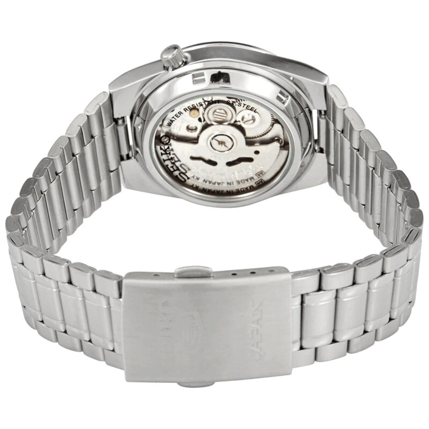 Rear view of the Seiko 5 SNK063J5 automatic watch showing the exhibition caseback, visible mechanical movement, stainless steel bracelet, and Seiko-branded clasp.