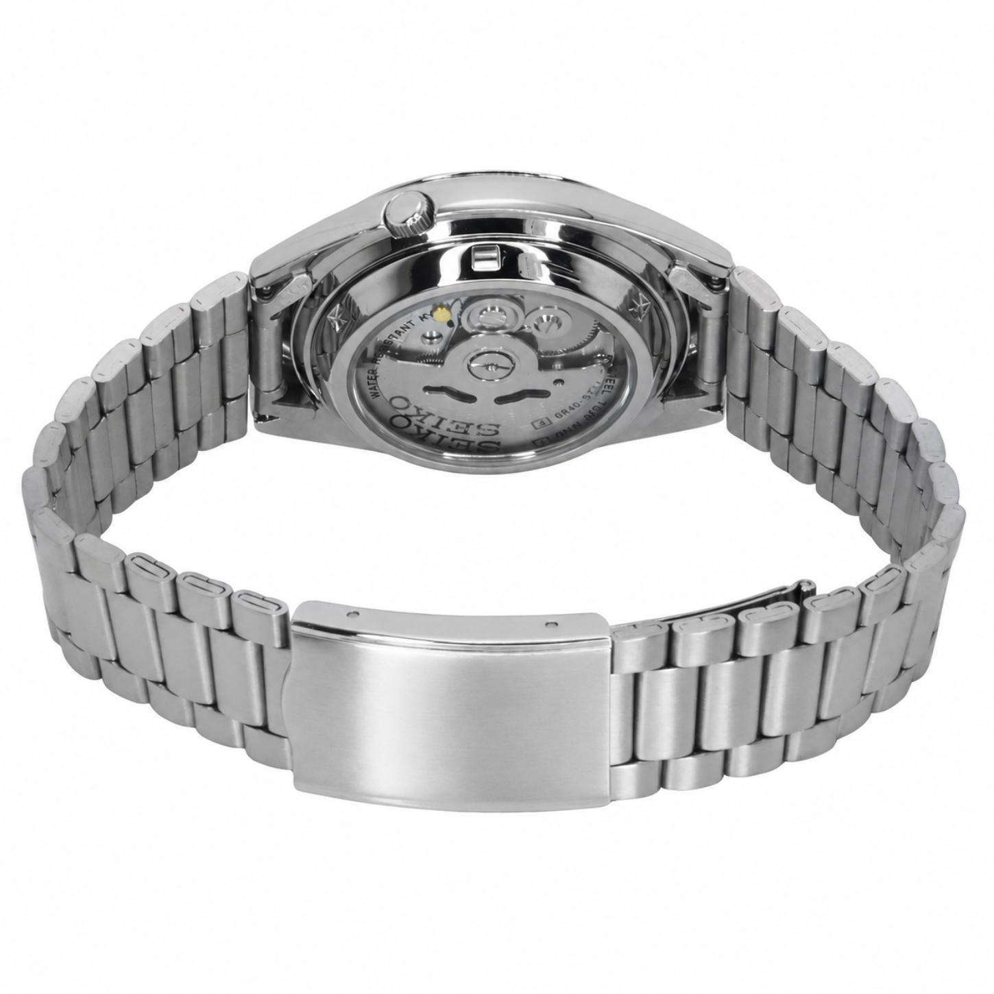 Rear view of the Seiko 5 SNXS73K1 automatic watch showing the exhibition caseback, visible mechanical movement, stainless steel bracelet, and clasp.