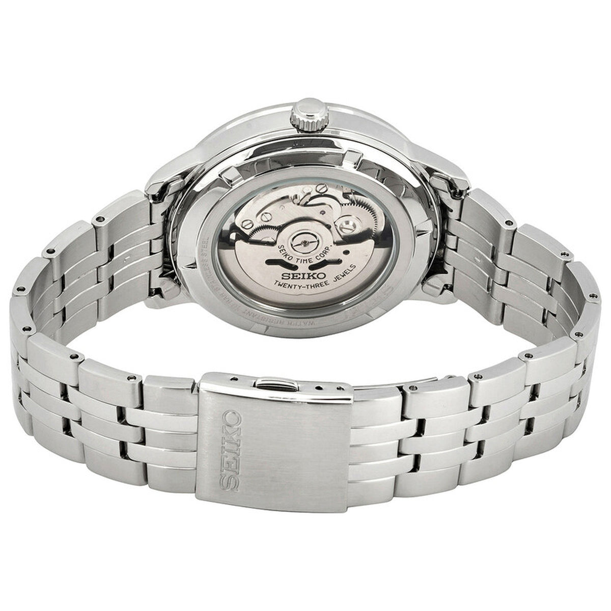 Seiko Essentials SRPH89K1 men's automatic watch highlighting the exhibition case back and stainless steel bracelet with signed clasp.