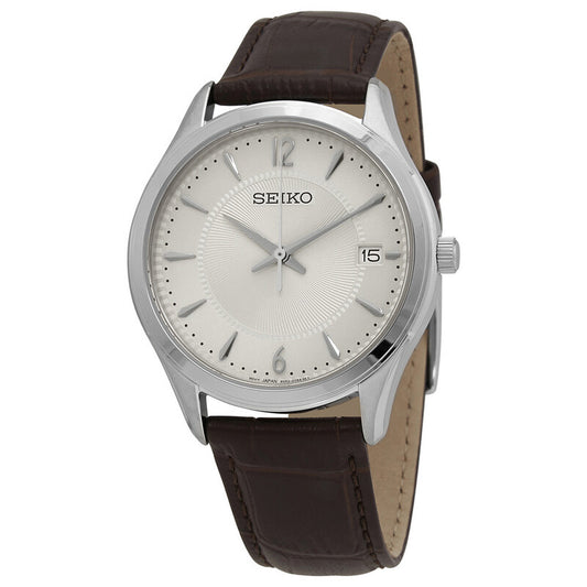 Seiko Noble SUR421 men's watch featuring a patterned antique white dial, date window, and brown leather band.