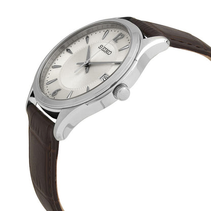 Seiko Noble SUR421 angled view showing the polished stainless steel case, crown, and brown leather strap.