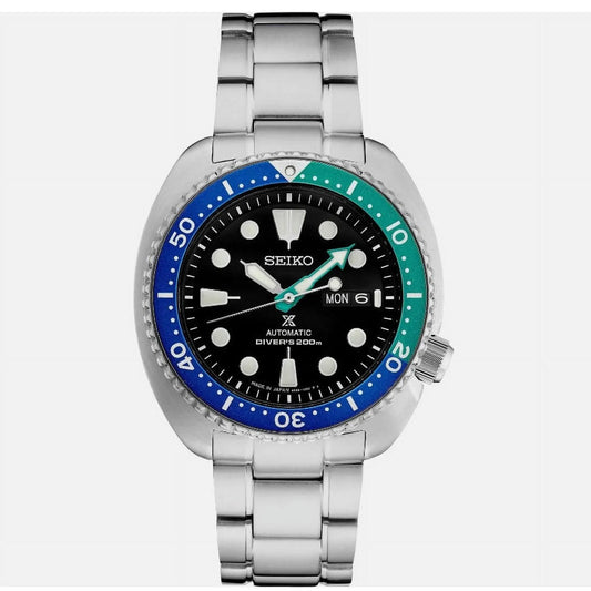 Seiko Prospex SRPJ35 automatic dive watch with black dial, Tropical Lagoon blue-green bezel, luminous markers and stainless steel bracelet.
