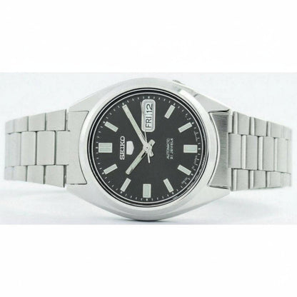 Seiko SNXS79K1 automatic watch with black dial, day-date display and stainless steel bracelet shown from front view.