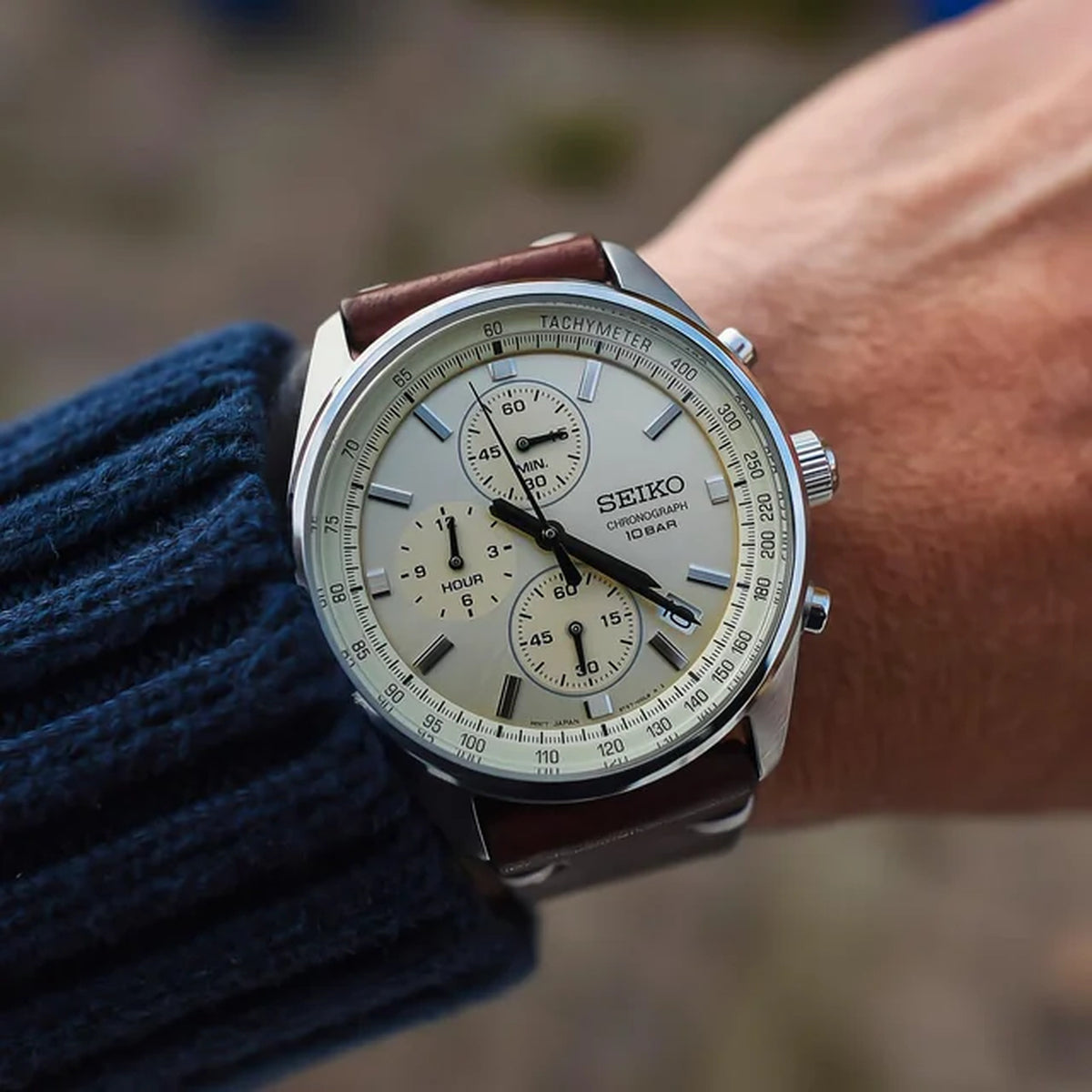 Seiko SSB383 men's chronograph watch with a champagne dial and brown leather strap worn on the wrist.