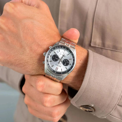 Seiko SSB425P1 chronograph watch worn on the wrist with white dial, black subdials and stainless steel bracelet.