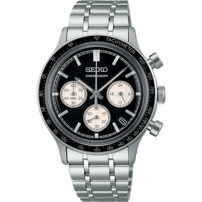 Seiko SSB479P1 sport chronograph watch featuring a black reverse panda dial, three contrasting subdials, tachymeter bezel, date display, and silver-tone bracelet.
