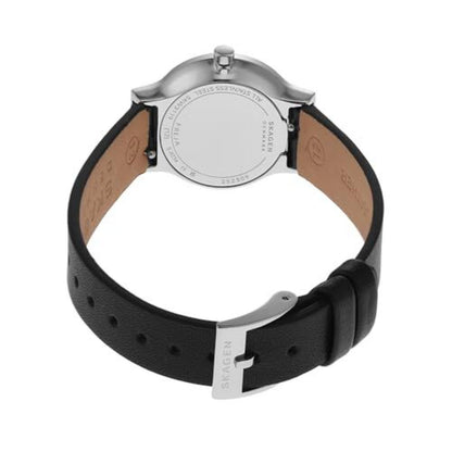 Skagen Freja Lille SKW3119 with stainless steel rear case, slim silver-tone profile, and black leather strap with silver-tone pin buckle closure.