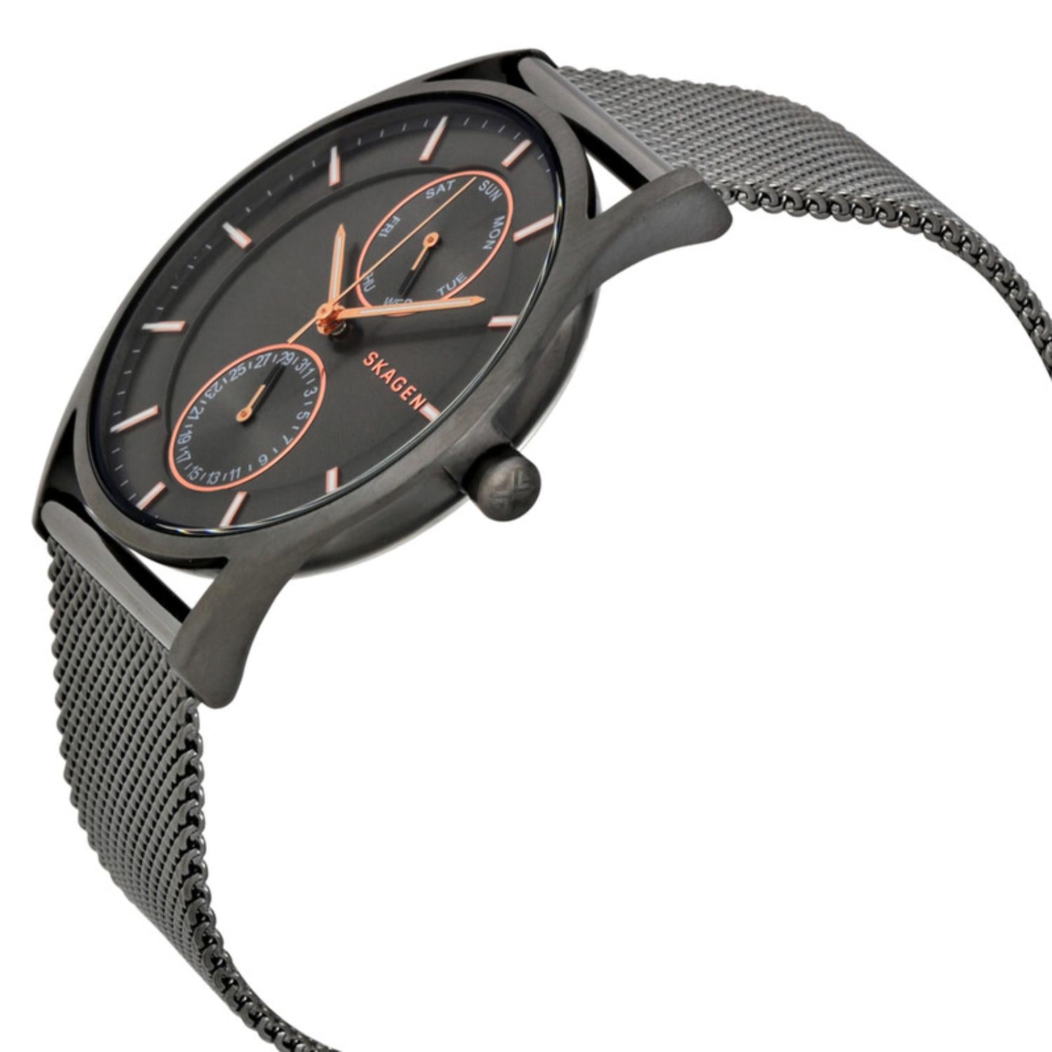 Skagen Holst SKW6180 multifunction watch with charcoal gray dial, rose gold-tone accents, slim black case, and black mesh bracelet shown in an angled side view.