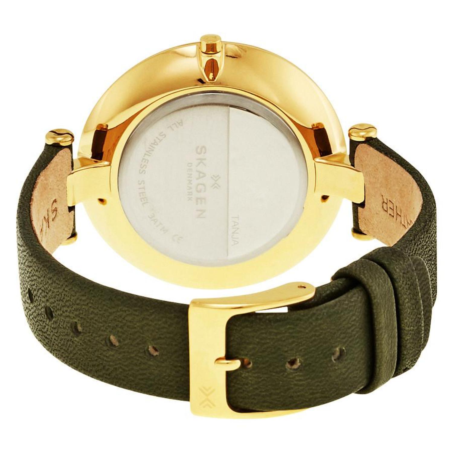 Skagen SKW2483 with polished gold-tone rear case, olive green leather strap, and gold-tone pin buckle closure with slim minimalist design.