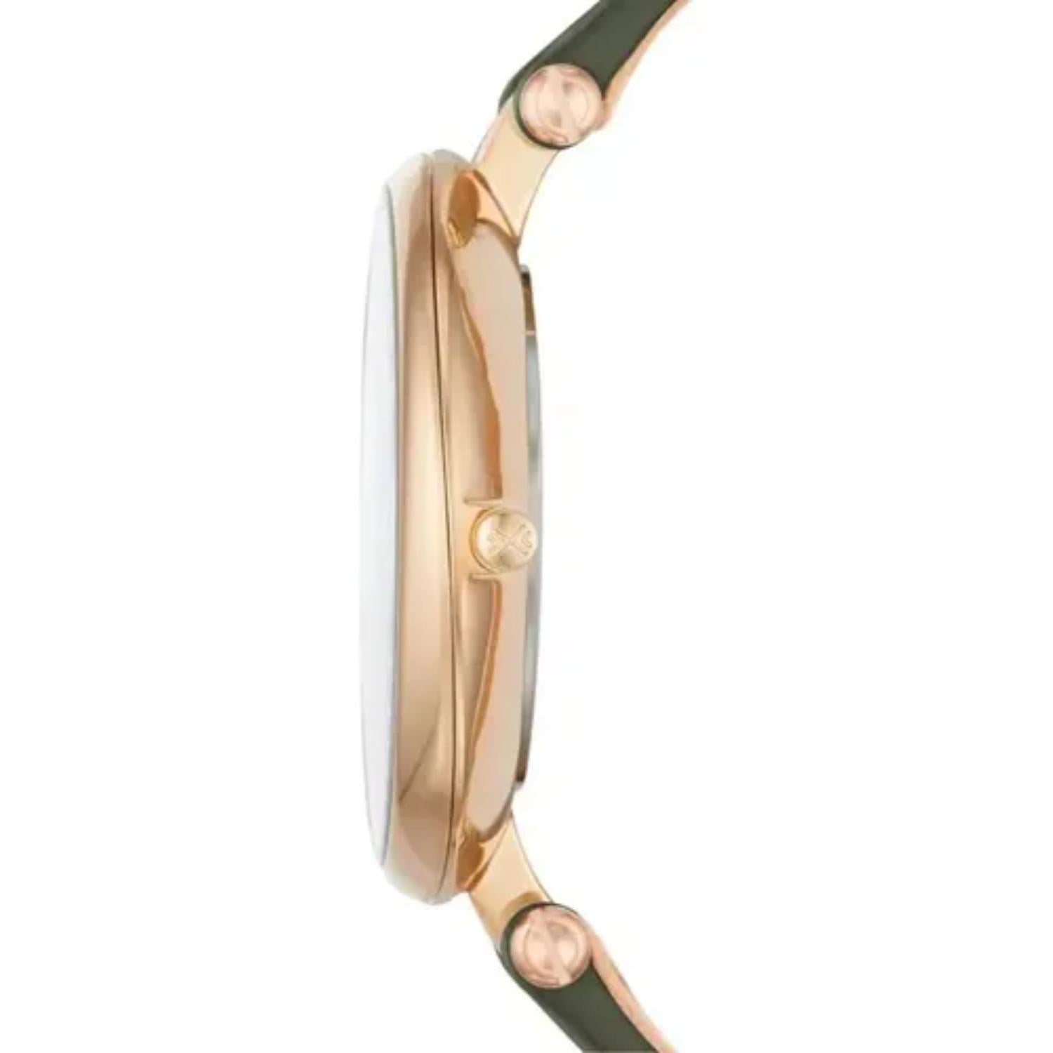 Skagen SKW2483 with ultra-slim gold-tone case profile, minimalist crown, and olive green leather strap attachment.