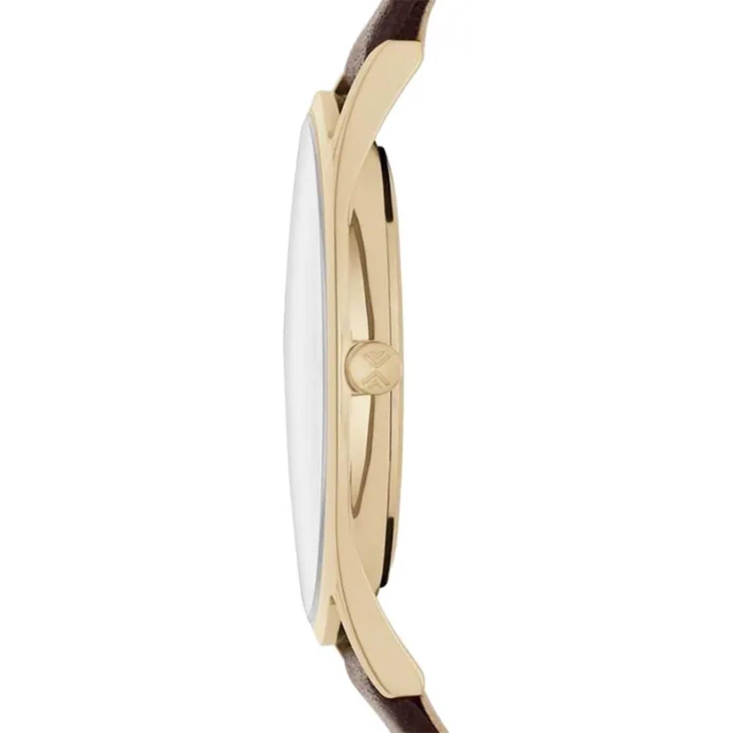 Skagen SKW6225 with ultra-slim gold-tone case profile, engraved minimalist crown, and brown leather strap attachment.