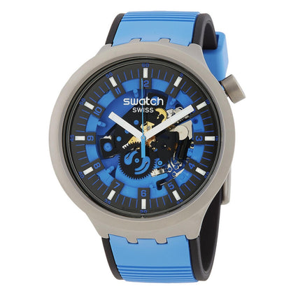 Swatch Big Bold Irony SB07S106 watch with a blue openworked dial, gray case, white hands, and blue strap with black lining.