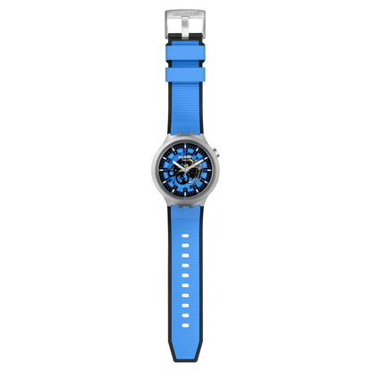 Swatch Big Bold Irony SB07S106 watch with a blue openworked dial, gray case, full-length blue strap, adjustment holes, and metal buckle.