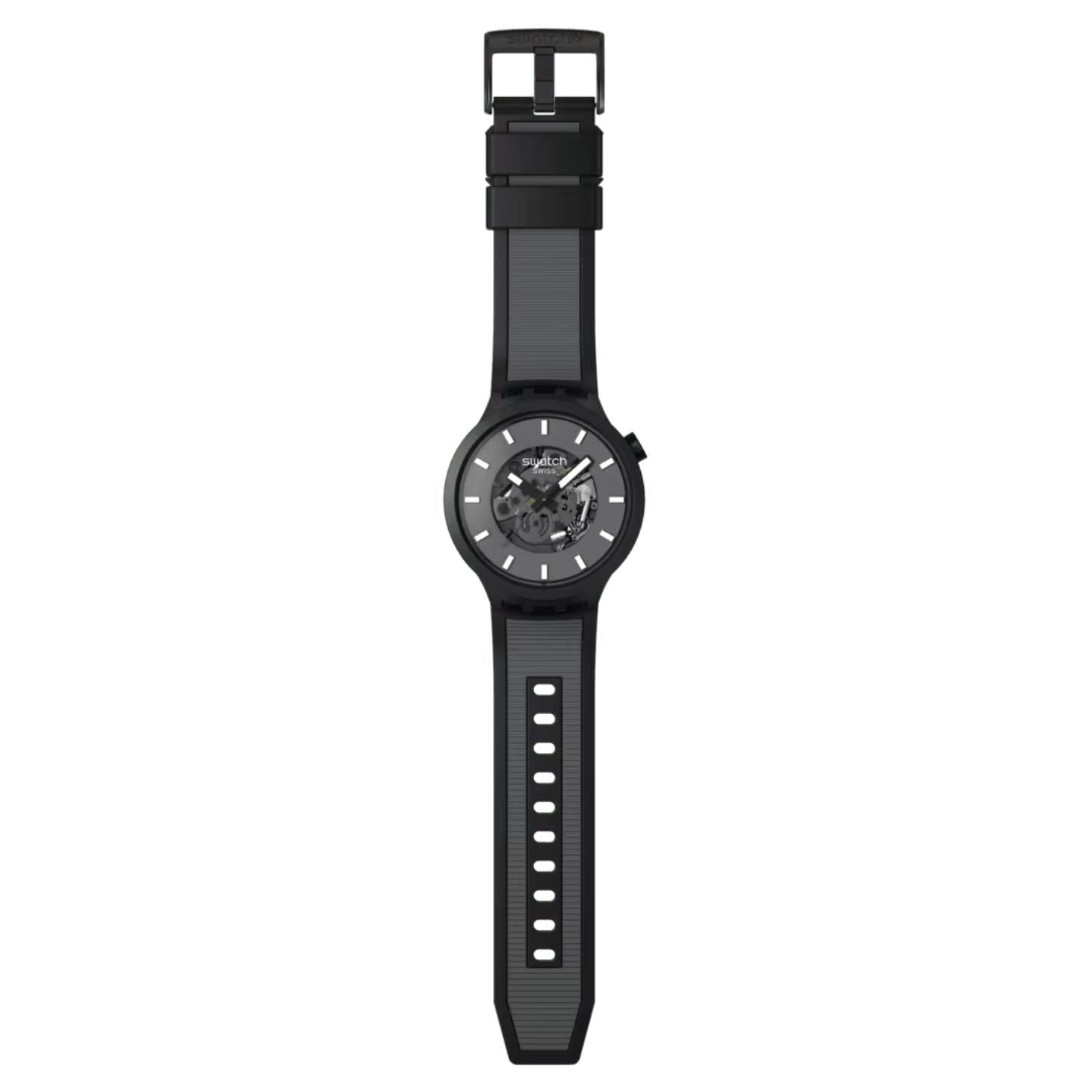 Swatch Big Bold Past the Horizon SB05B113 watch with a dark openworked dial, black case, full-length black strap with gray textured detailing, adjustment holes, and black buckle.