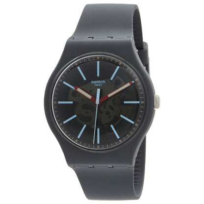 Swatch Cobblestone Street SO29A101 with gray patterned dial, light blue hour markers, red hands, dark gray case, and matching dark gray strap.